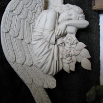 Барельеф ангела с цветами на памятник. Высота барельефа ангела для памятника - 75 см. Цена барельефа ангела для памятника - $350.