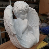 Ангел для памятника. Высота ангела для памятника - 56 см., глубина скульптуры ангела - 30 см., ширина скульптуры ангела - 60 см.